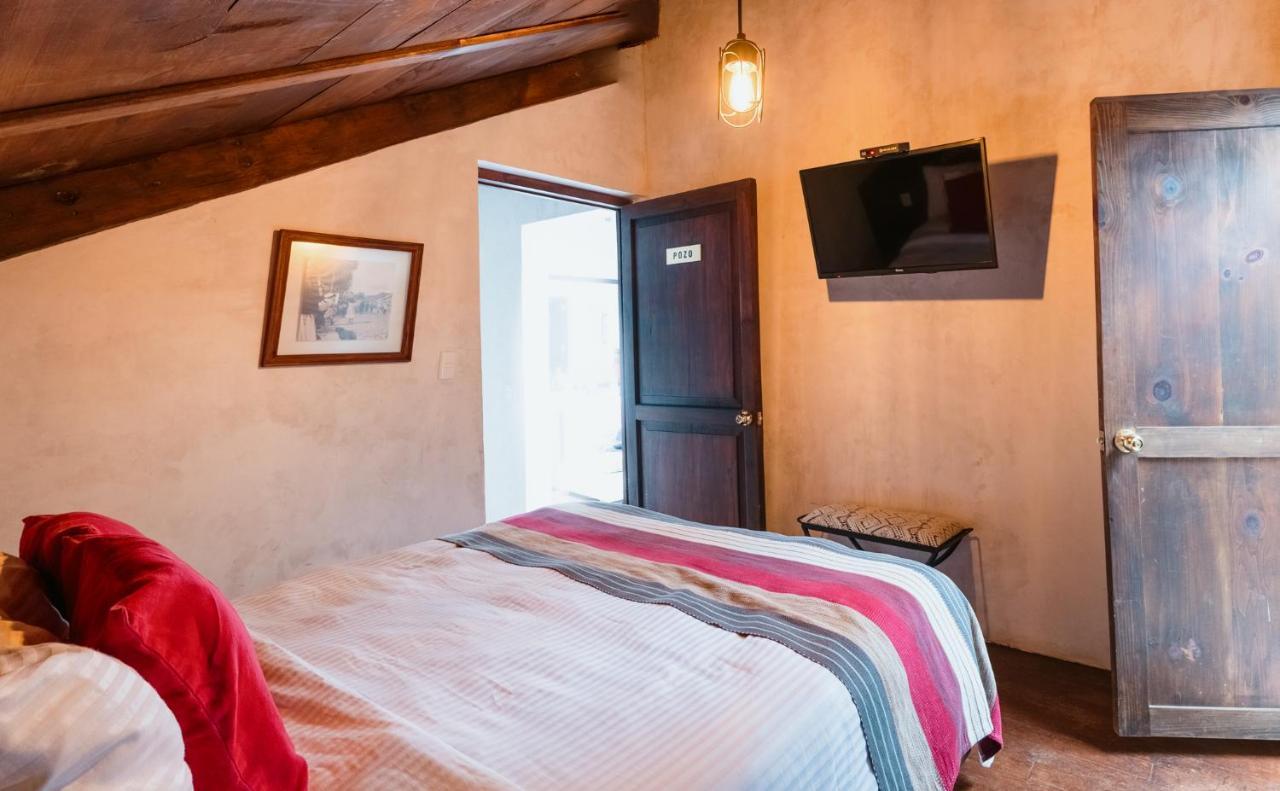 Yox Hotel Boutique San Cristobal de las Casas Exterior photo A room at the hotel