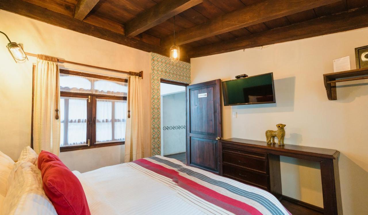 Yox Hotel Boutique San Cristobal de las Casas Exterior photo A bedroom at the hotel